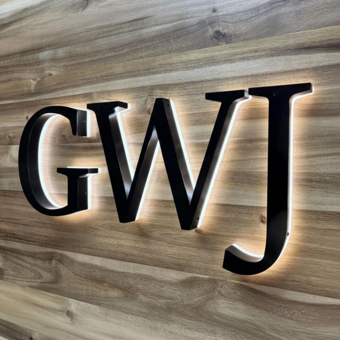 Halo backlit metal letters on an interior wall